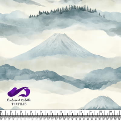 Misty mountains and trees in muted blue and gray tones