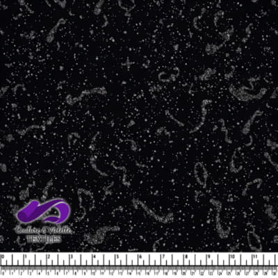 Tissu noir avec un motif de tourbillons et paillettes argentées