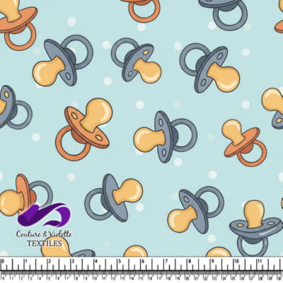 Motif de Sucette Bébé sur Fond Bleu